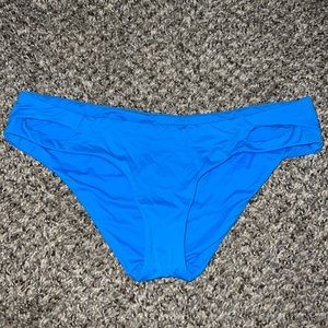 royal blue bathing suit bottoms with cut outs